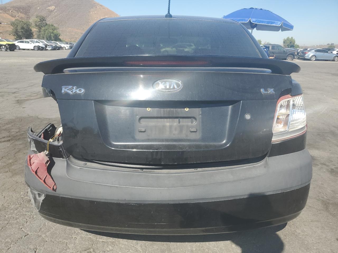 2009 Kia Rio Base VIN: KNADE223496584674 Lot: 62762945