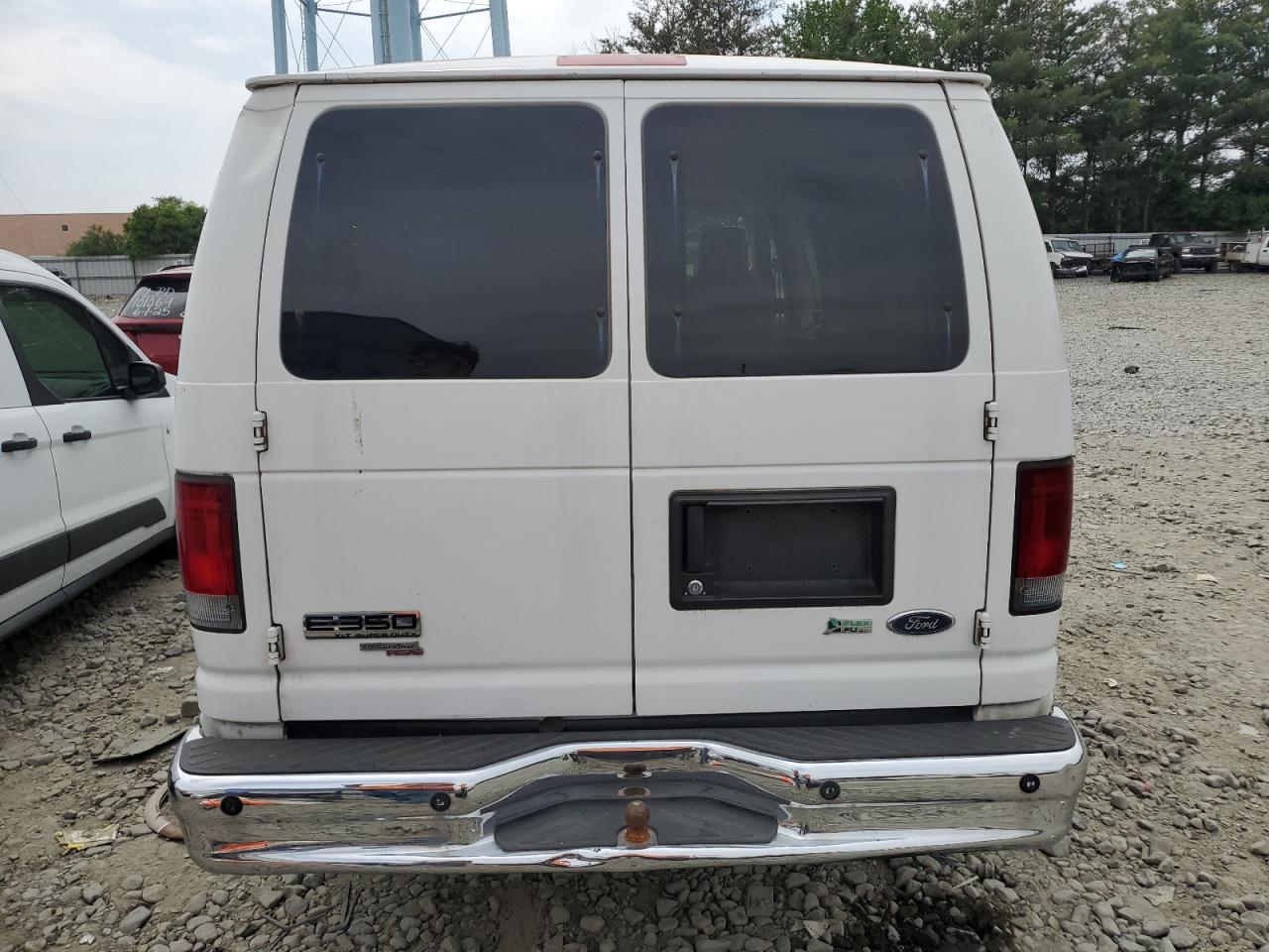 2010 Ford Econoline E350 Super Duty Wagon VIN: 1FBNE3BL9ADA58073 Lot: 61831885