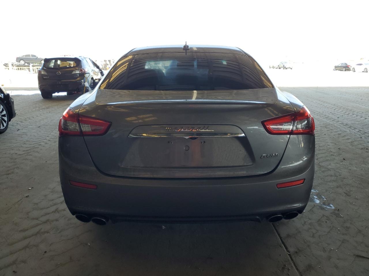 2014 Maserati Ghibli VIN: ZAM57XSAXE1103486 Lot: 61009365