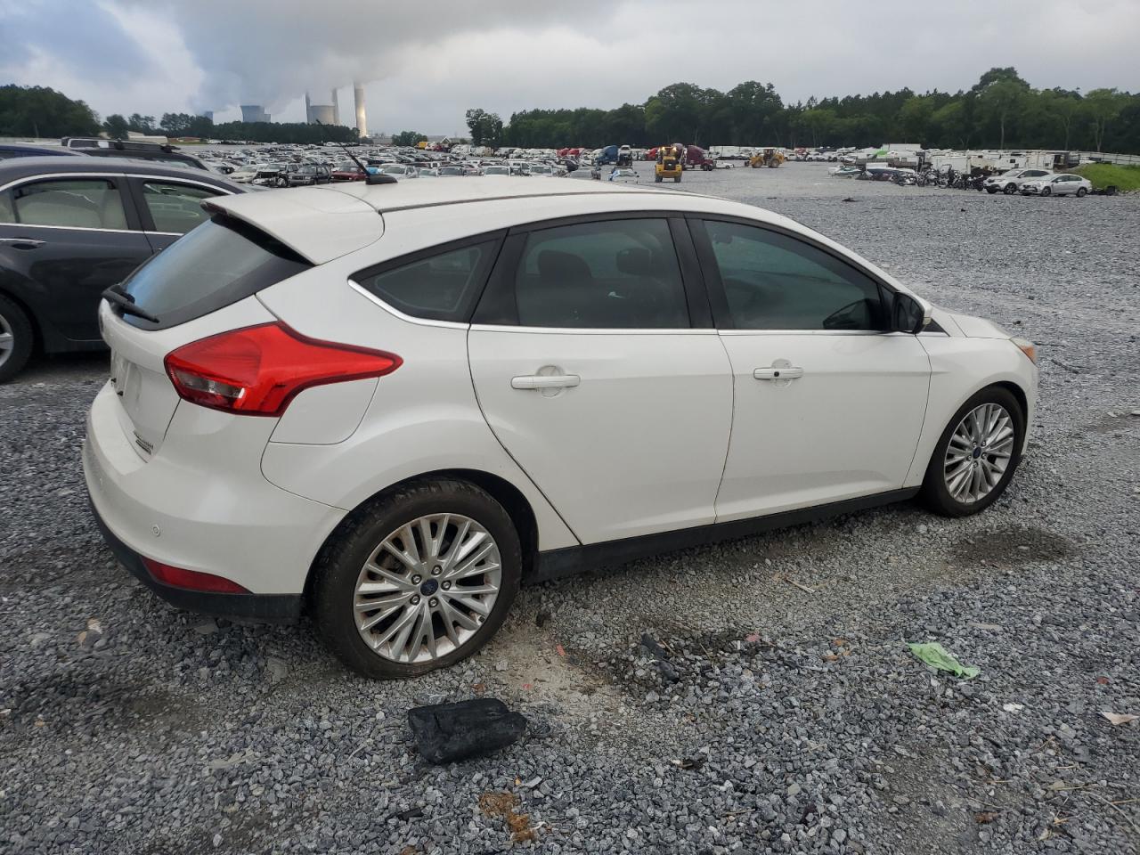 2016 Ford Focus Titanium VIN: 1FADP3N22GL292399 Lot: 63033385