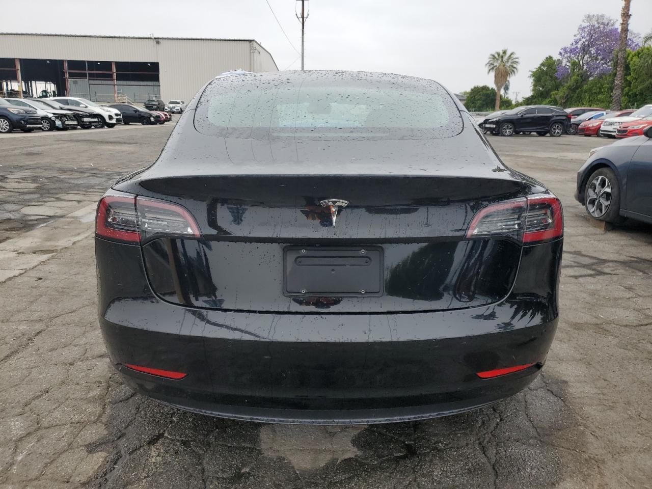 2022 Tesla Model 3 VIN: 5YJ3E1EA8NF303929 Lot: 59785375