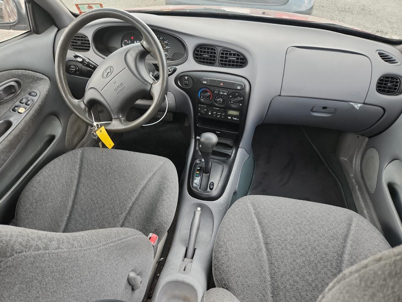 1999 Hyundai Elantra Base VIN: KMHJF25F6XU833540 Lot: 63153215