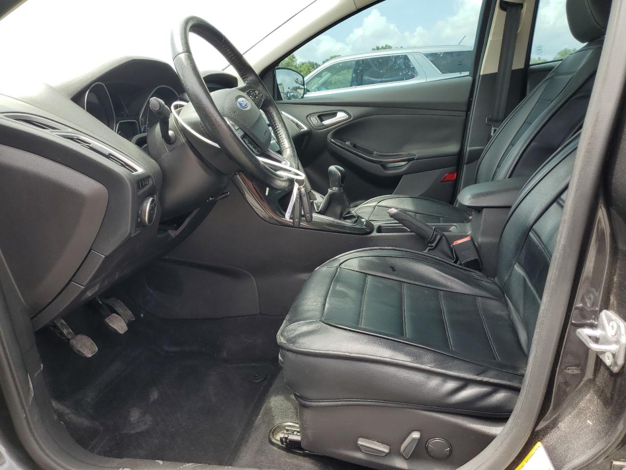 2015 Ford Focus Titanium VIN: 1FADP3N28FL239706 Lot: 62478895