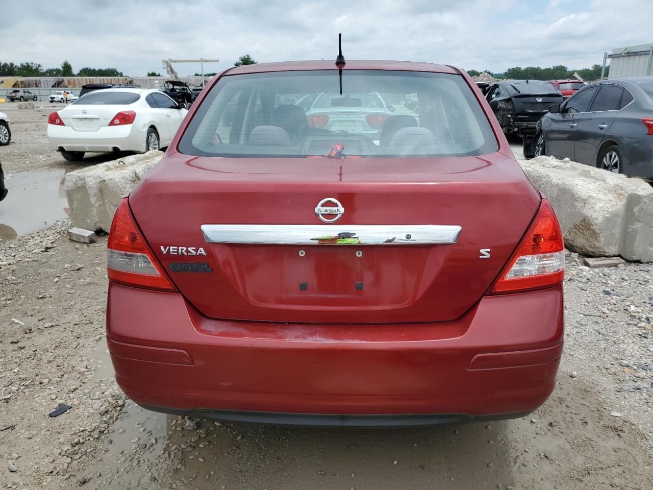 2009 Nissan Versa S VIN: 3N1BC11E39L399358 Lot: 63047055
