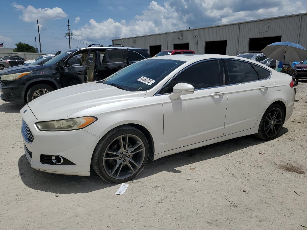2013 Ford Fusion Titanium იყიდება Jacksonville-ში, FL - Rear End