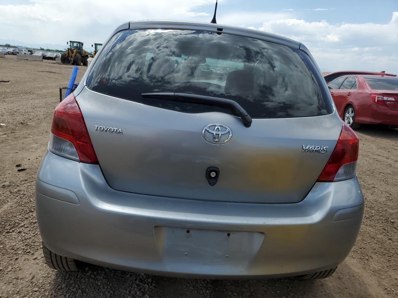2010 Toyota Yaris VIN: JTDKT4K35A5296586 Lot: 62794025