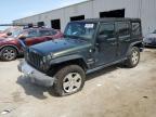 2010 Jeep Wrangler Unlimited Sahara for Sale in Jacksonville, FL - Front End