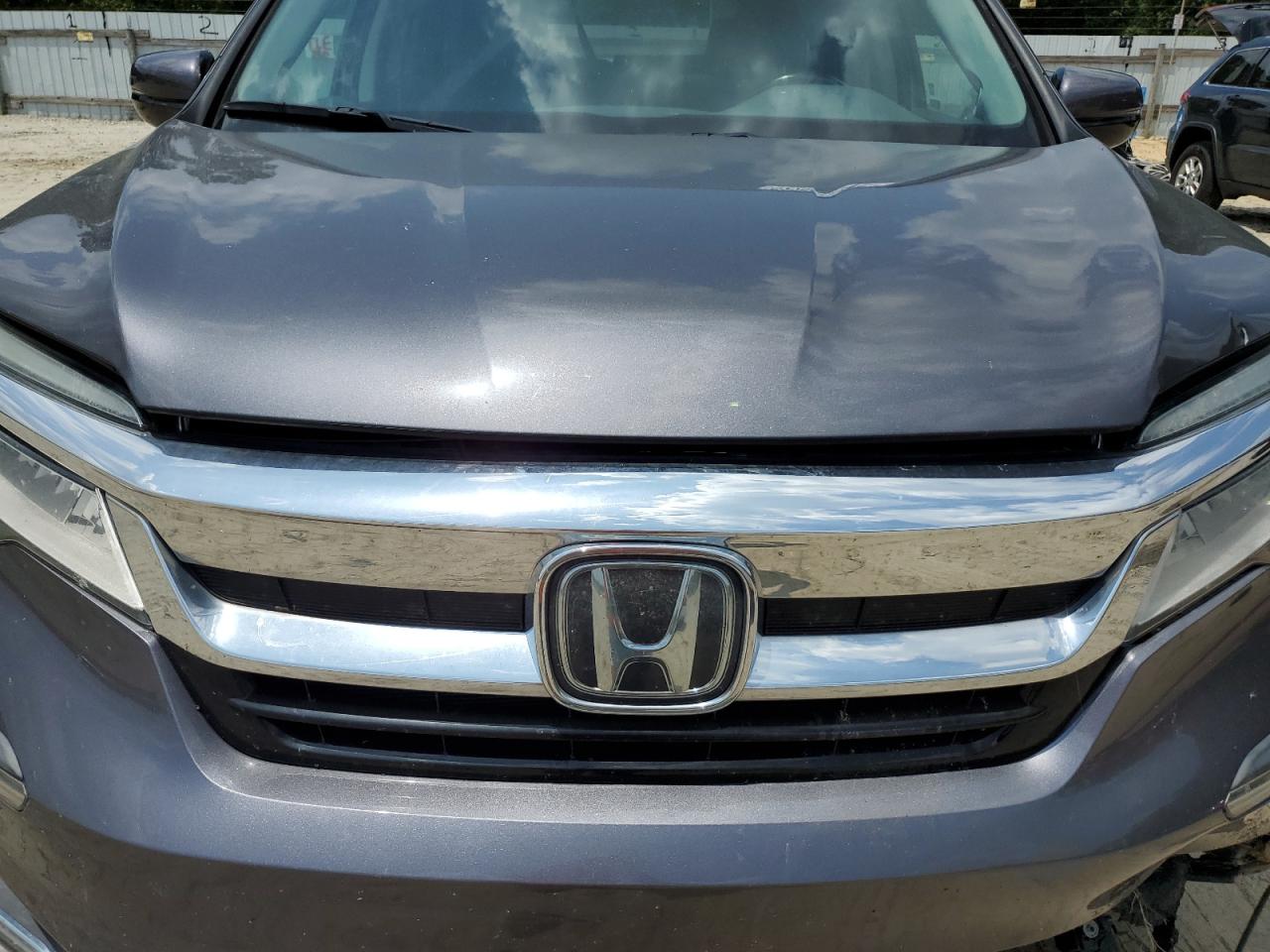 2019 Honda Pilot Elite VIN: 5FNYF6H01KB056297 Lot: 62206975