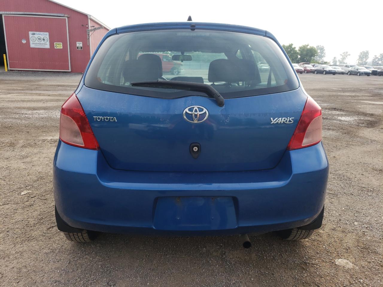 2008 Toyota Yaris VIN: JTDKT923285151335 Lot: 61918085