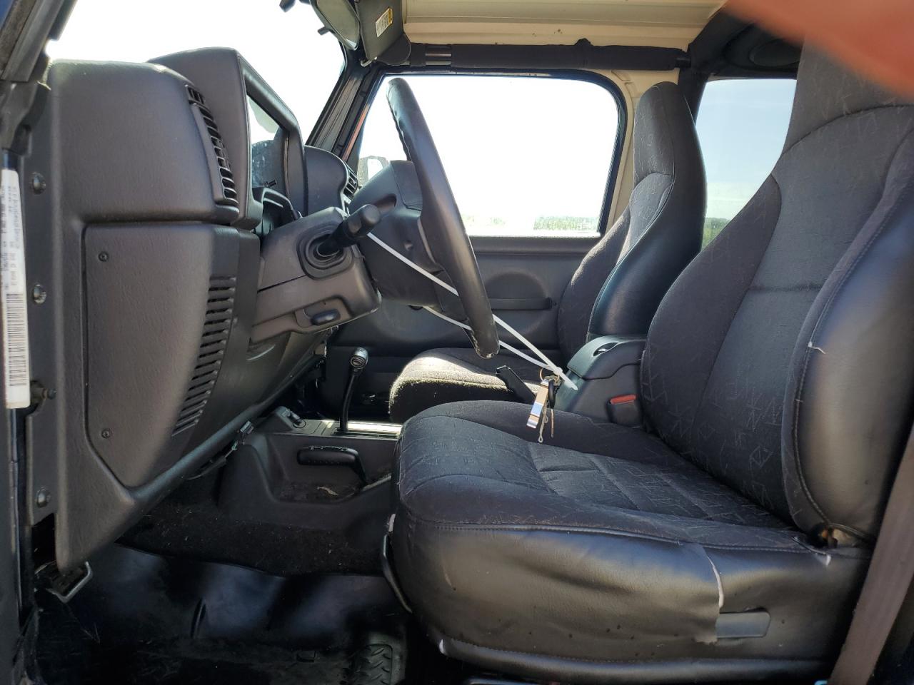 2002 Jeep Wrangler / Tj Sport VIN: 1J4FA49S92P709775 Lot: 61345735