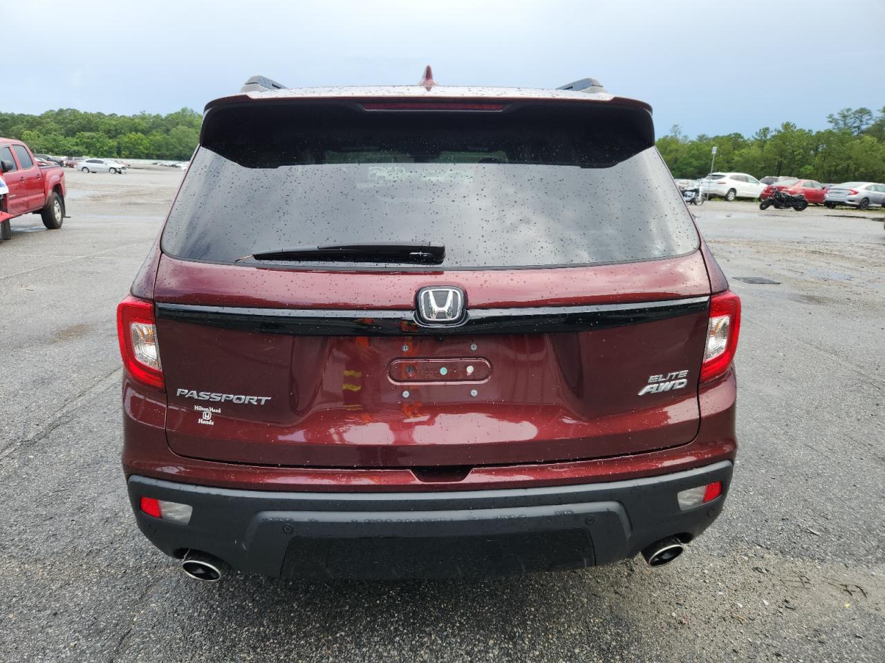2021 Honda Passport Elite VIN: 5FNYF8H07MB002713 Lot: 64270625