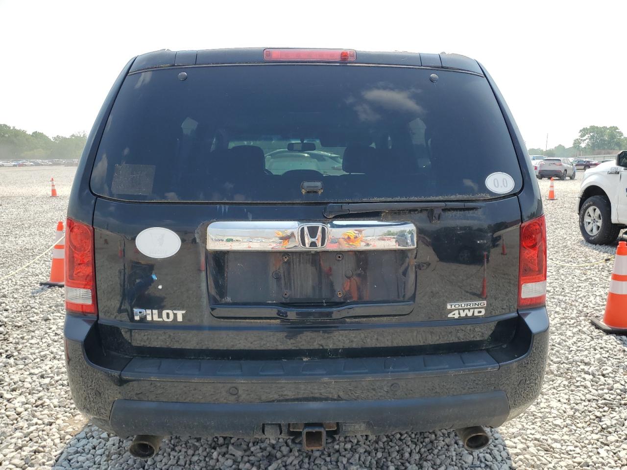 2010 Honda Pilot Touring VIN: 5FNYF4H85AB031699 Lot: 58597955