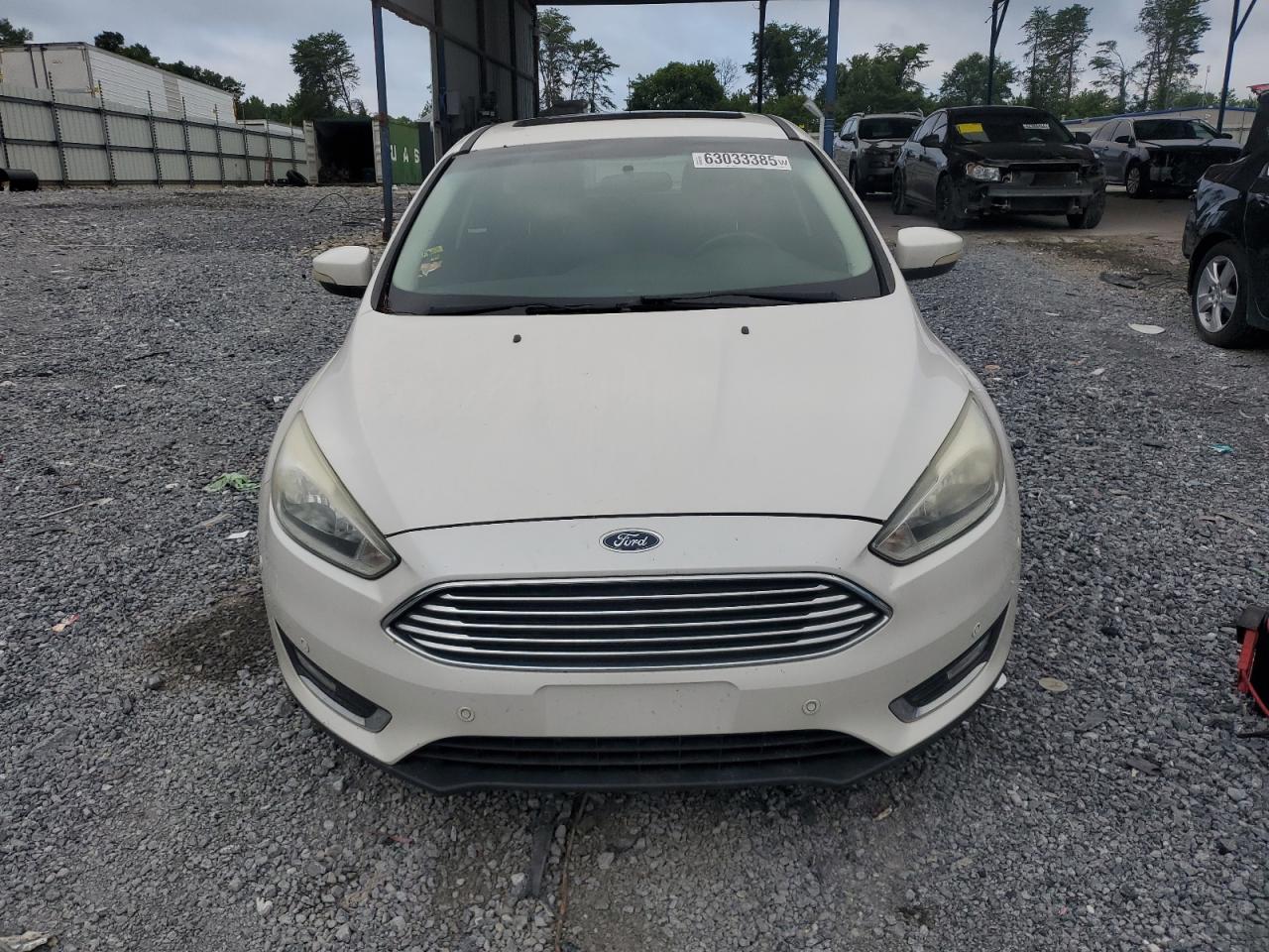 2016 Ford Focus Titanium VIN: 1FADP3N22GL292399 Lot: 63033385