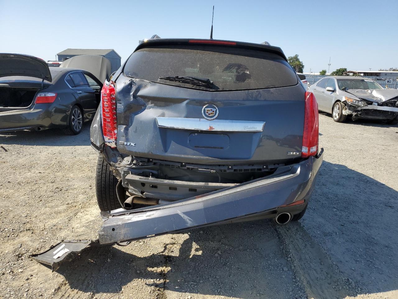 2012 Cadillac Srx Performance Collection VIN: 3GYFNBE32CS596228 Lot: 60002985