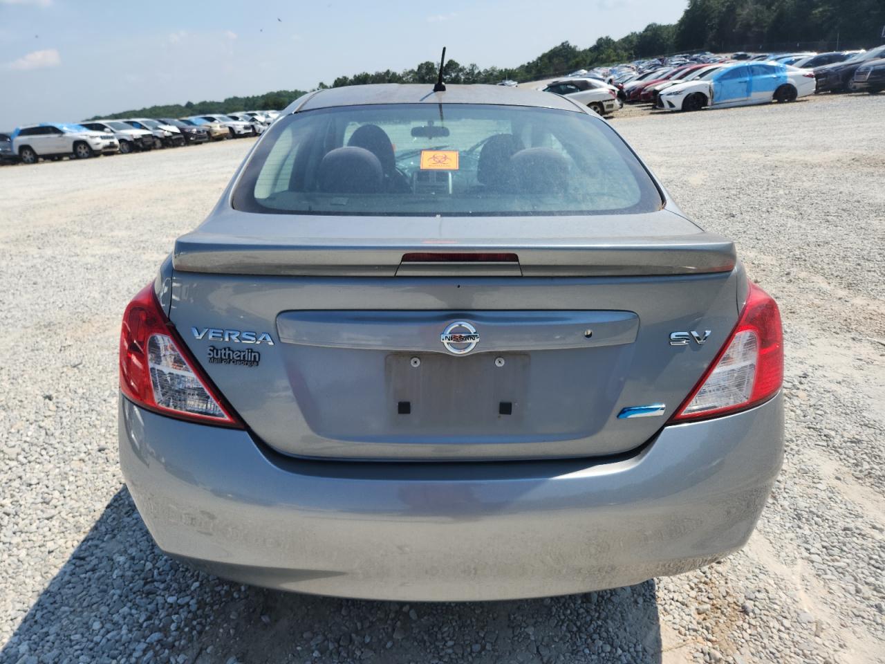 2014 Nissan Versa S VIN: 3N1CN7AP6EL808871 Lot: 62346165