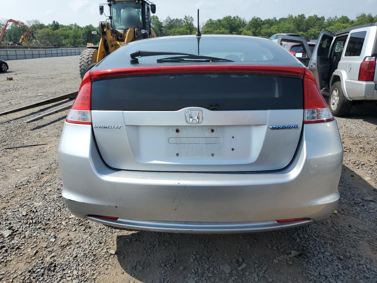 2010 Honda Insight Ex VIN: JHMZE2H77AS015329 Lot: 60502835