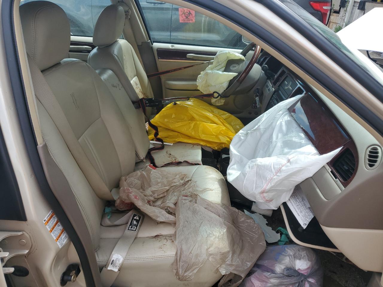 2003 Lincoln Town Car Cartier VIN: 1LNHM83W03Y654097 Lot: 61577105