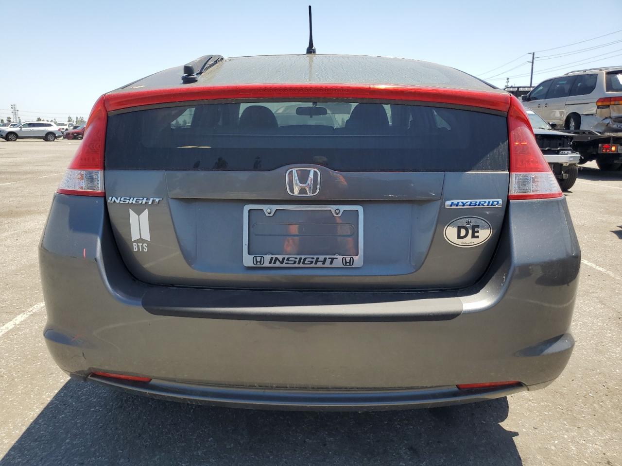 2010 Honda Insight Ex VIN: JHMZE2H72AS017439 Lot: 61777295