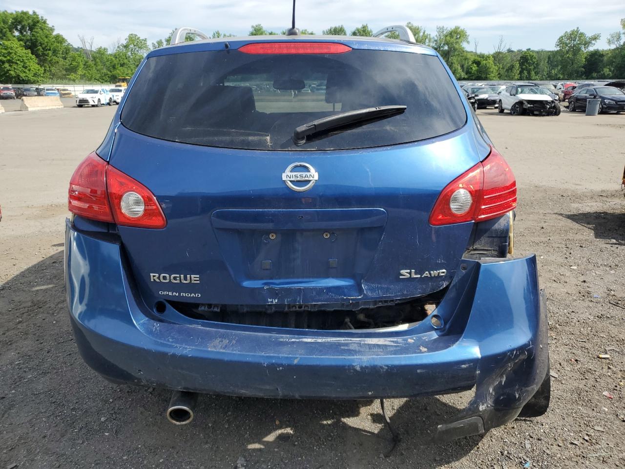 2009 Nissan Rogue S VIN: JN8AS58V99W166043 Lot: 63000695