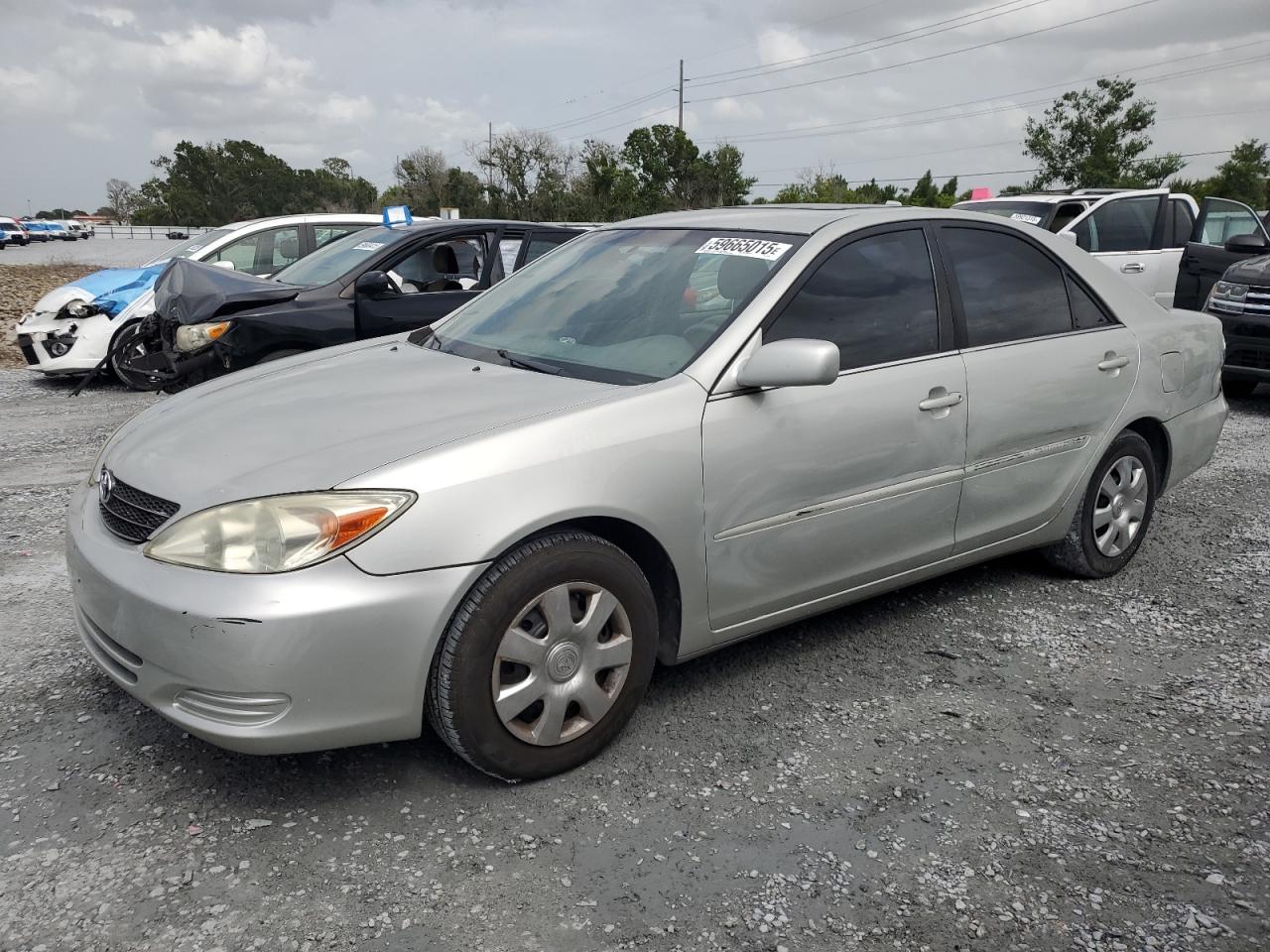 2003 Toyota Camry Le за продажба в Riverview, FL - Rear End