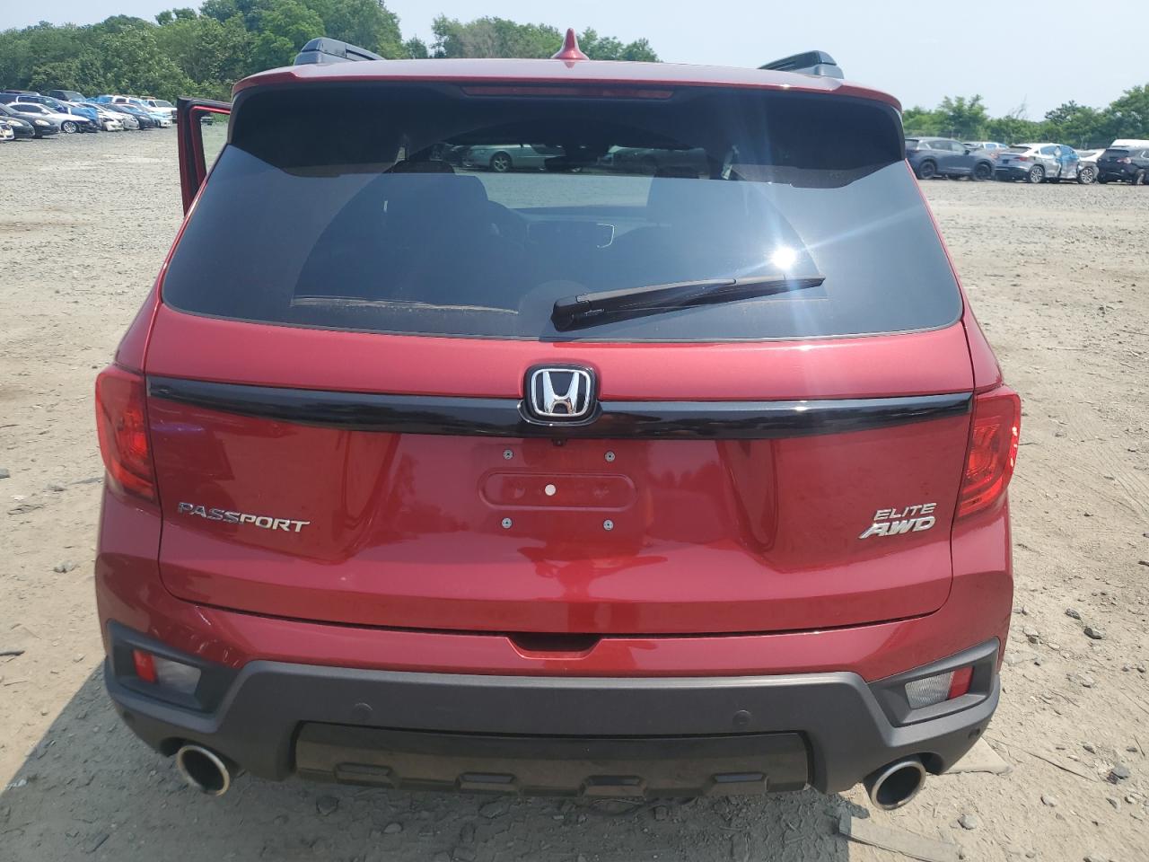 2022 Honda Passport Elite VIN: 5FNYF8H02NB013295 Lot: 60606335