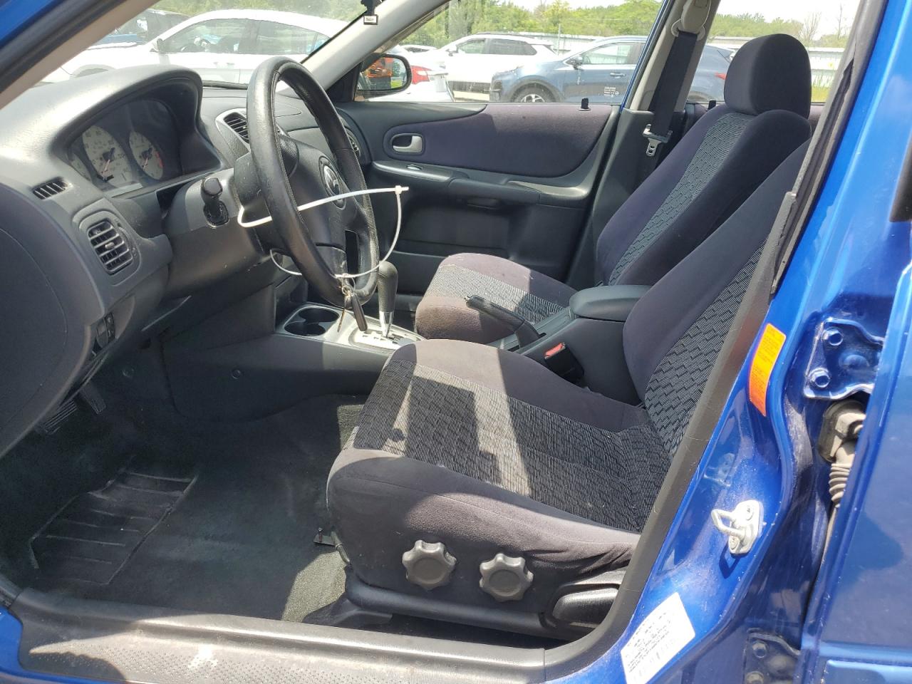 2003 Mazda Protege Dx VIN: JM1BJ226731170700 Lot: 62024475
