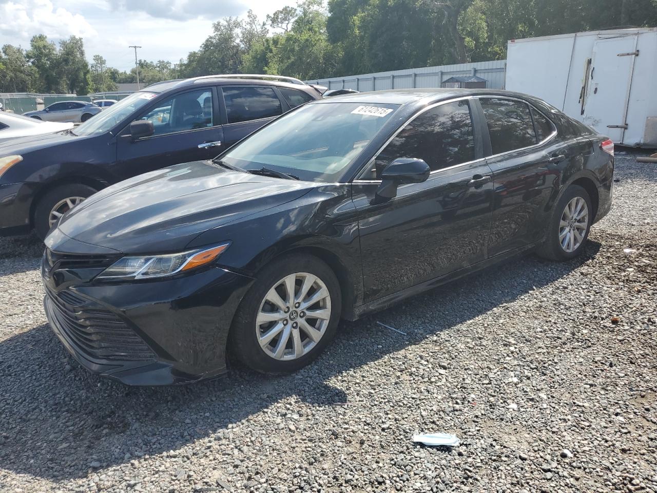 2018 Toyota Camry L იყიდება Riverview-ში, FL - Rear End