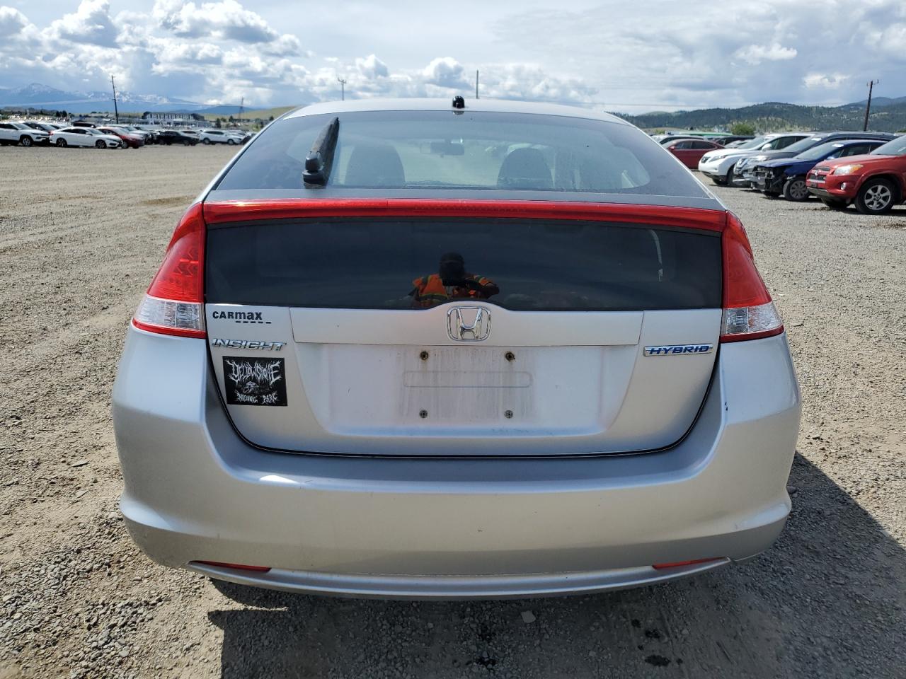 2010 Honda Insight Ex VIN: JHMZE2H75AS026040 Lot: 59714985