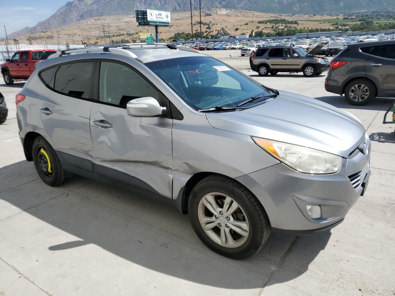 HYUNDAI TUCSON 2012 VIN KM8JUCACXCU542525 фото 4