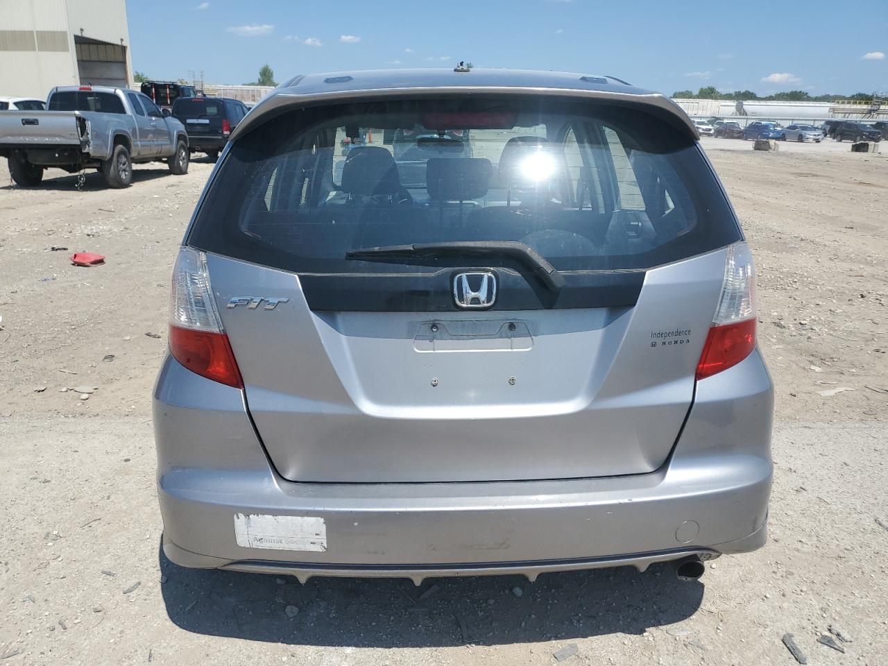 2009 Honda Fit Sport VIN: JHMGE88499S035304 Lot: 61804475