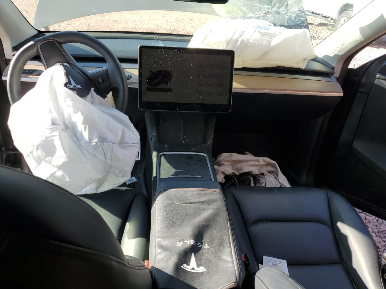 2023 Tesla Model Y VIN: 7SAYGDEF8PF777284 Lot: 62951295