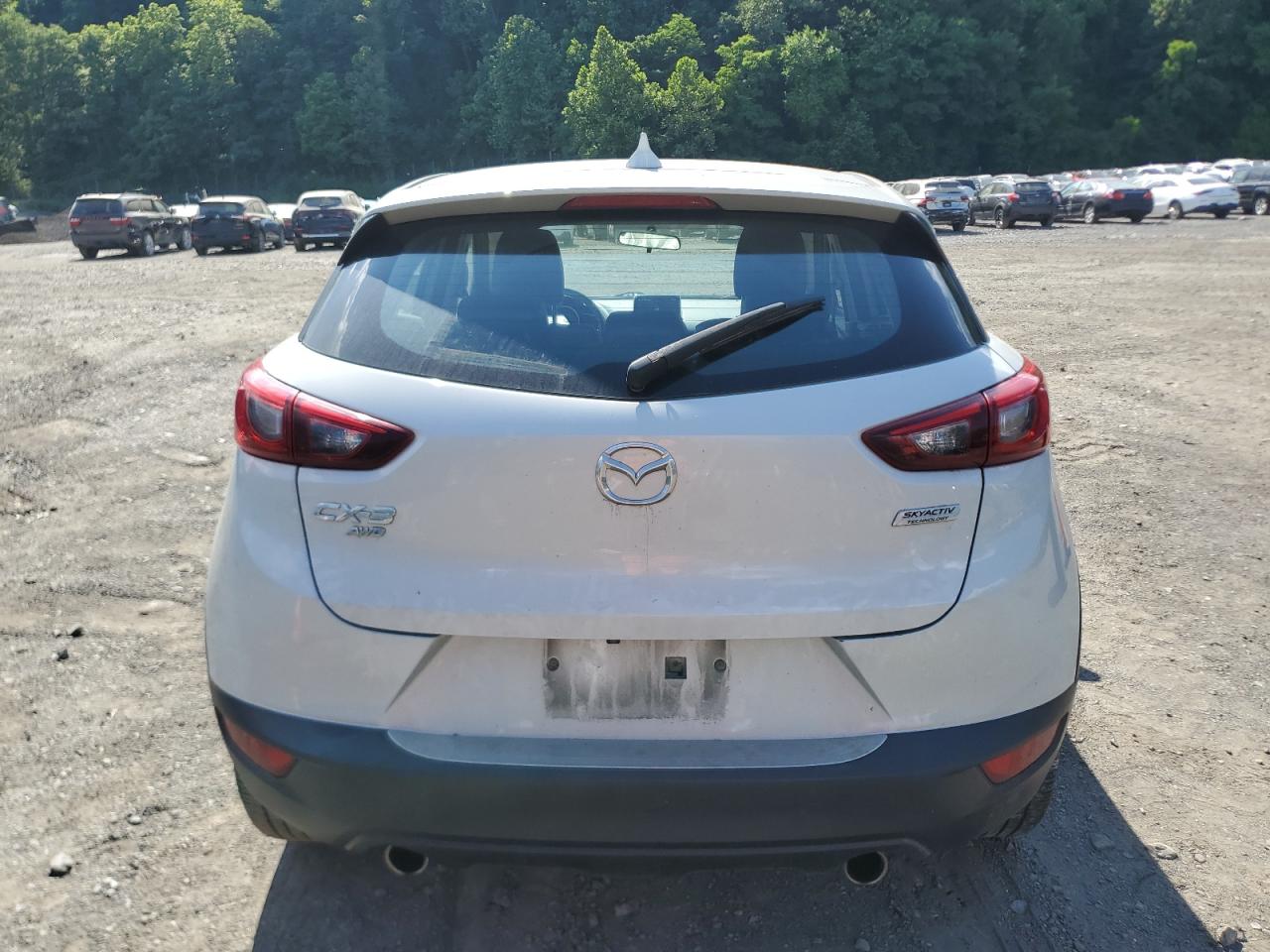 2017 Mazda Cx-3 Touring VIN: JM1DKFC78H0141403 Lot: 62076345
