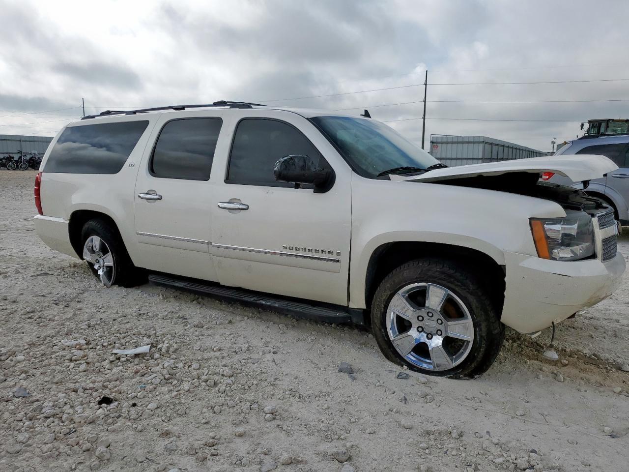 CHEVROLET SUBURBAN 2009 VIN 1GNFC36039R217259 photo 4