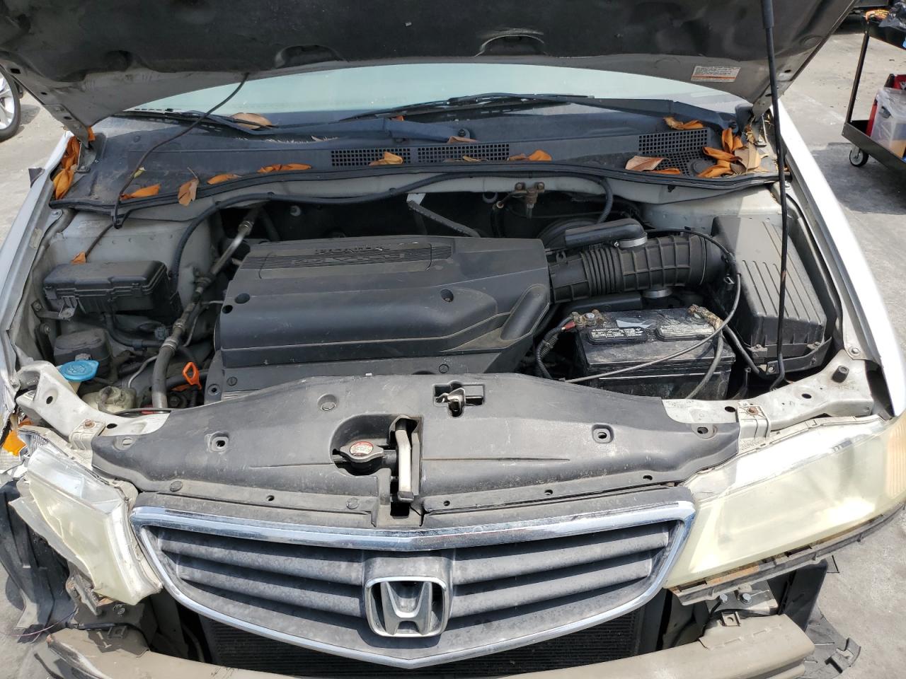 2002 Honda Odyssey Lx VIN: 2HKRL18512H507533 Lot: 62308185