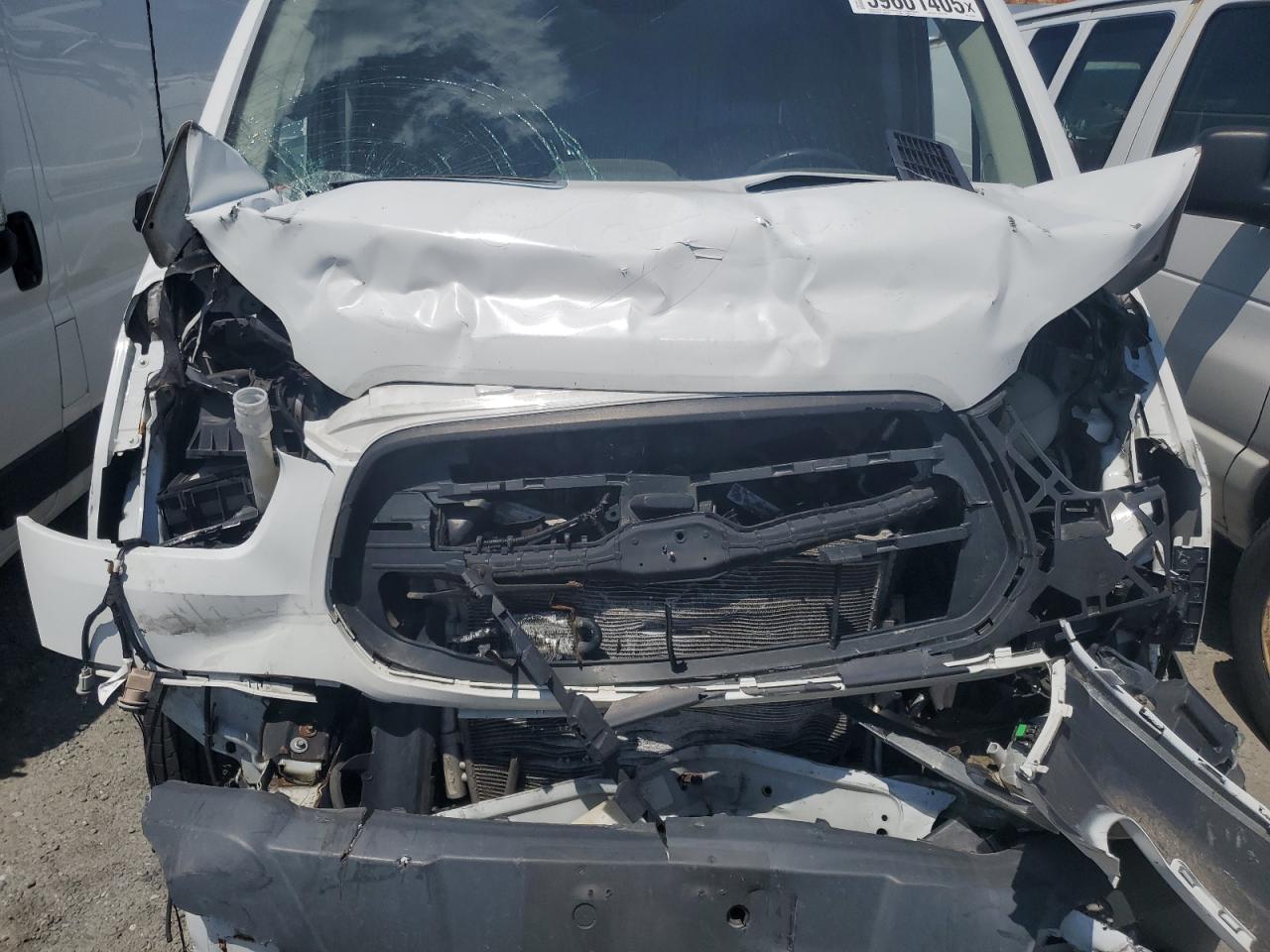 2015 Ford Transit T-150 VIN: 1FTNE1YM9FKA87446 Lot: 59601405