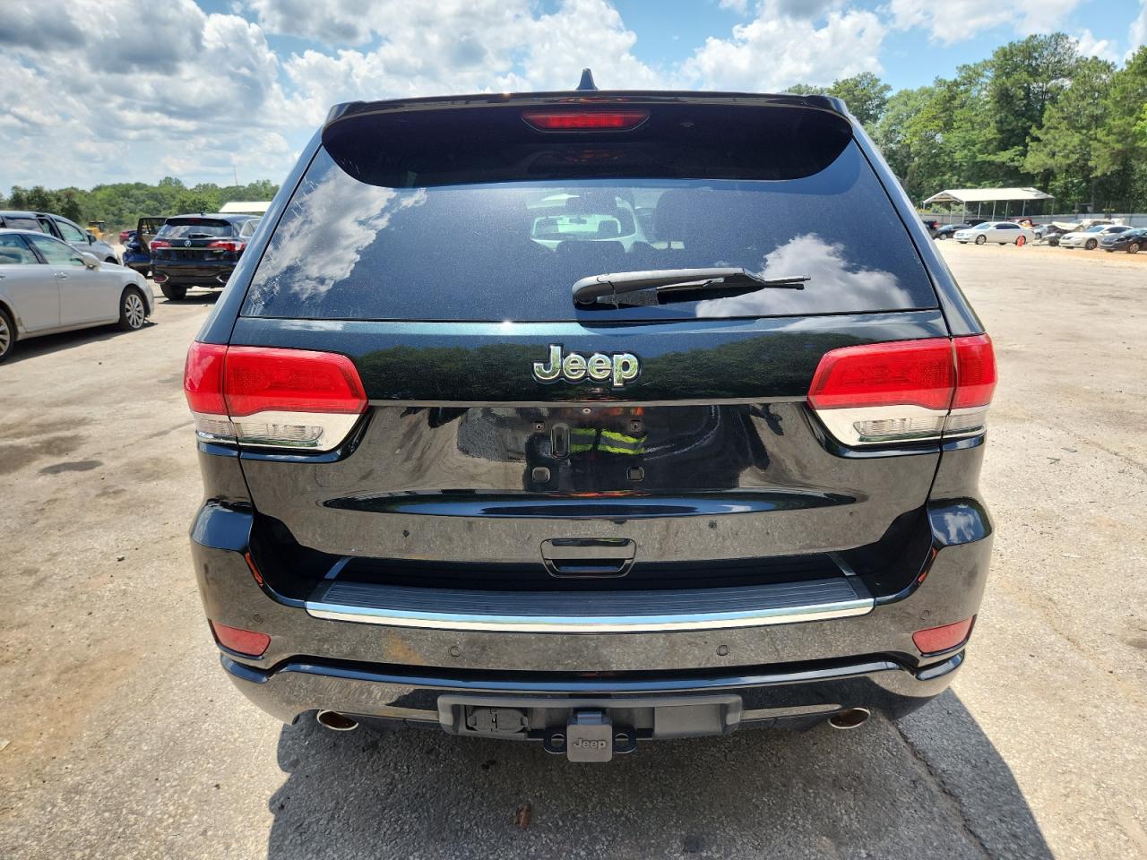 2015 Jeep Grand Cherokee Overland VIN: 1C4RJECG5FC841474 Lot: 59687415