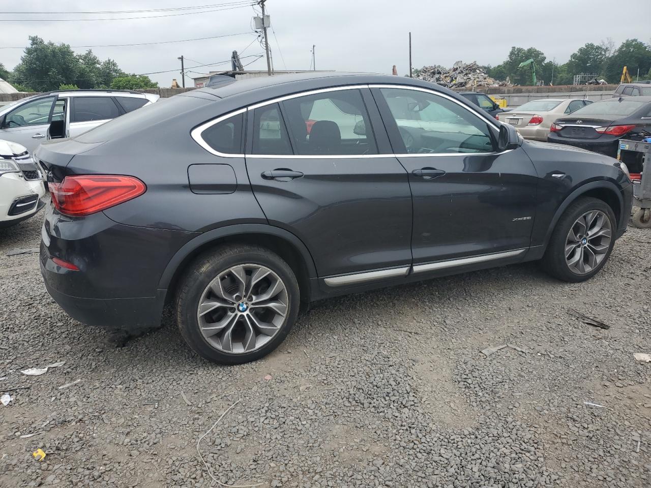 BMW X4 2015 VIN 5UXXW3C58F0M86859 zdjęcie 3