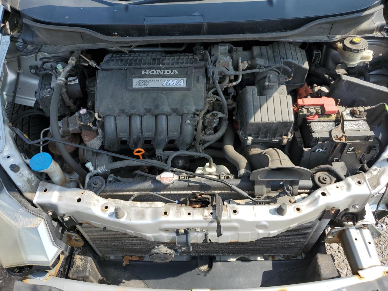 2010 Honda Insight Ex VIN: JHMZE2H77AS015329 Lot: 60502835