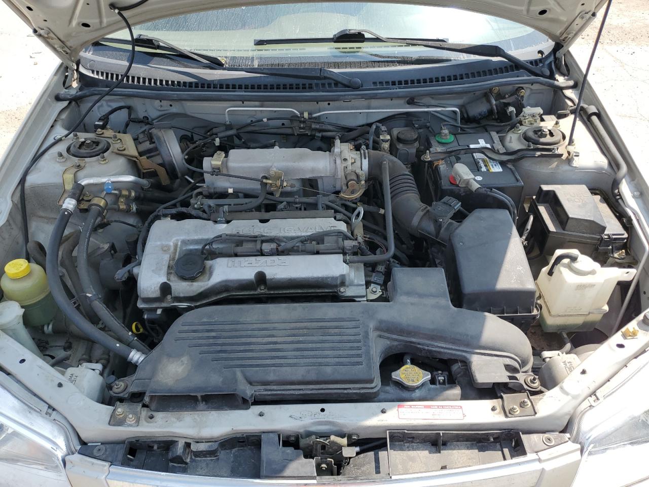 2000 Mazda Protege Dx VIN: JM1BJ2225Y0249762 Lot: 59950735