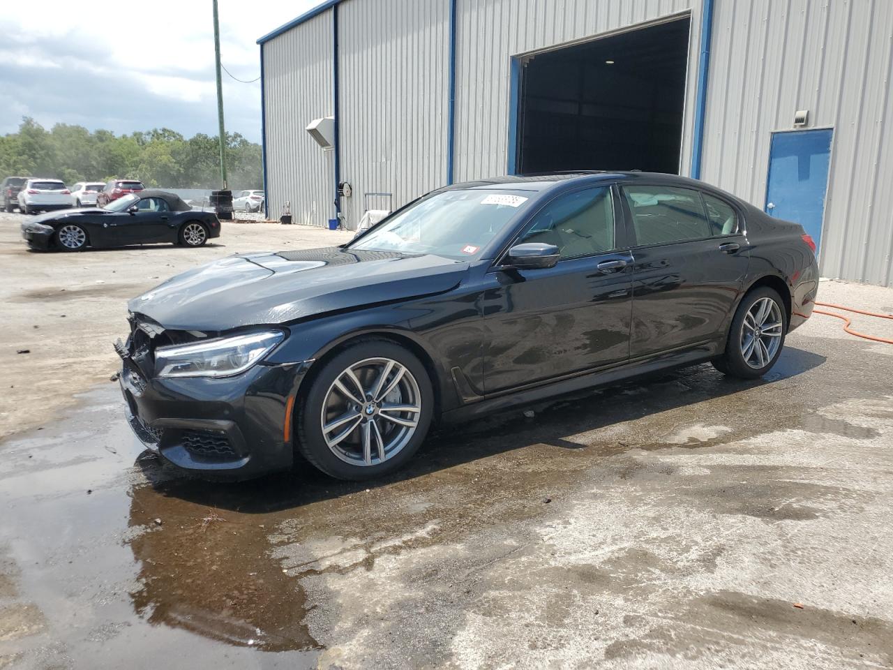 WBA7F2C55KB240701 BMW 7 SERIES Photo 1