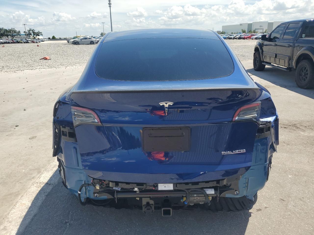 2024 Tesla Model Y VIN: 7SAYGDEF1RA283459 Lot: 58463435