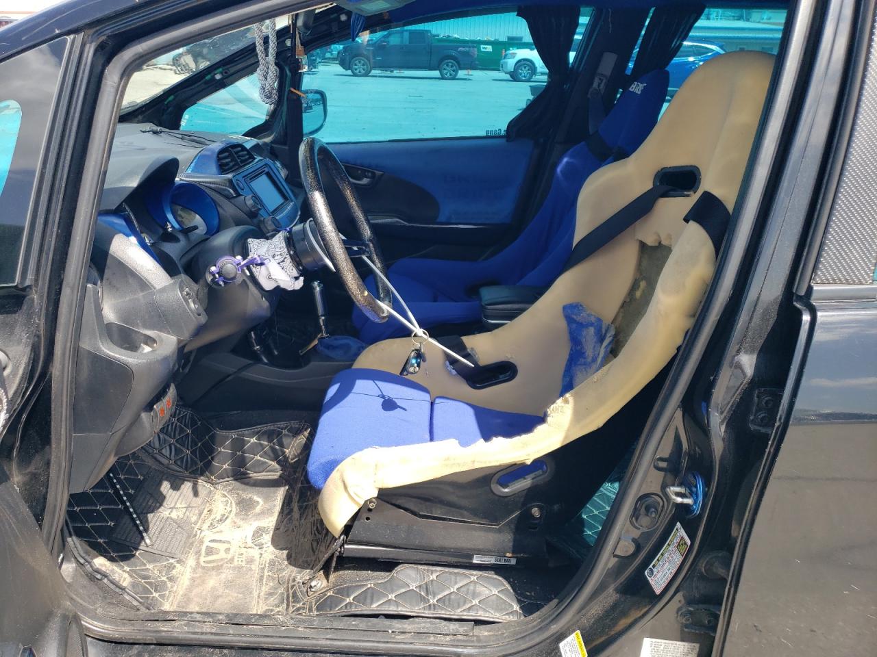 2009 Honda Fit VIN: JHMGE88239S038987 Lot: 60155435