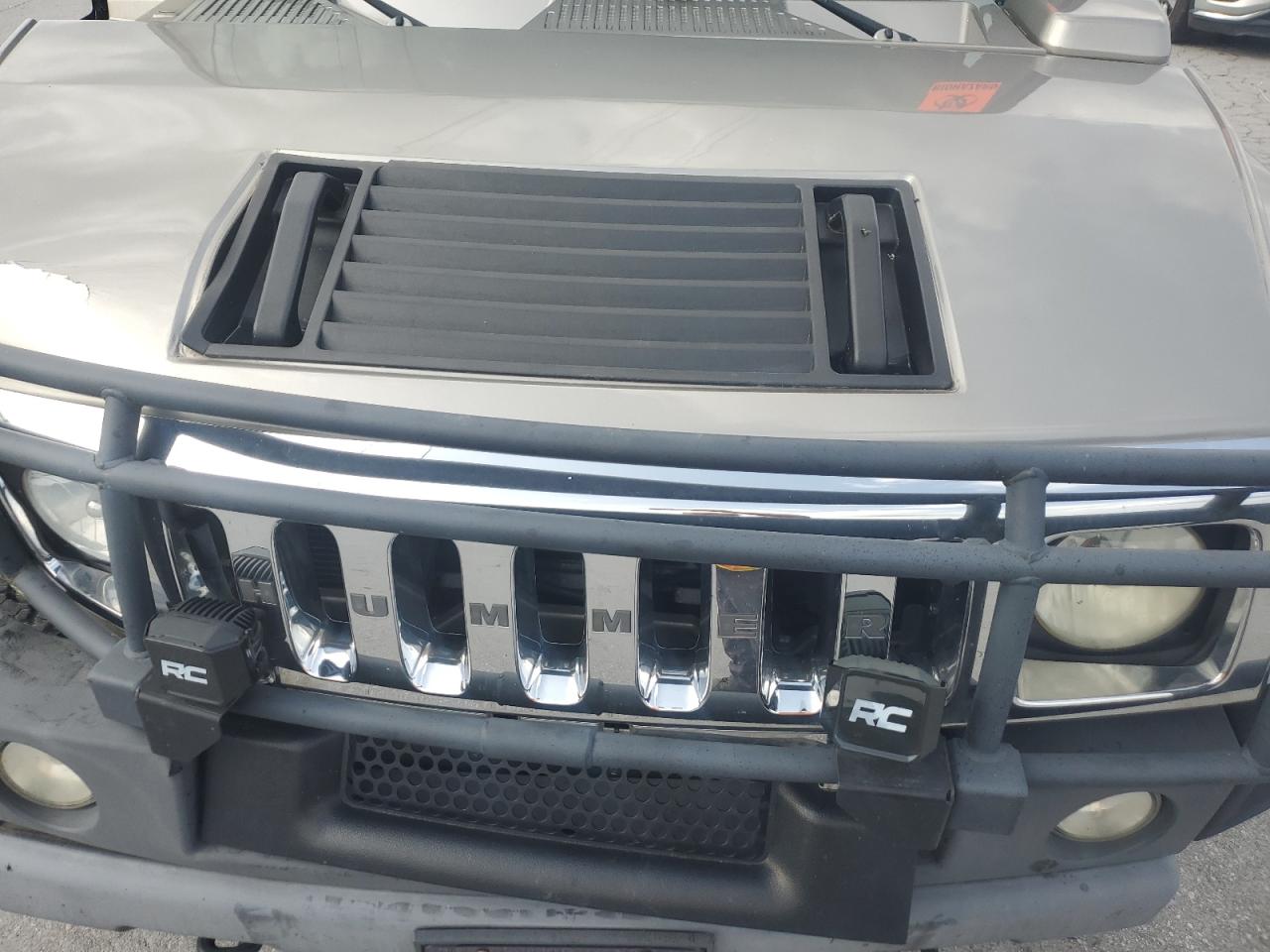 2003 Hummer H2 VIN: 5GRGN23U63H128919 Lot: 59884055