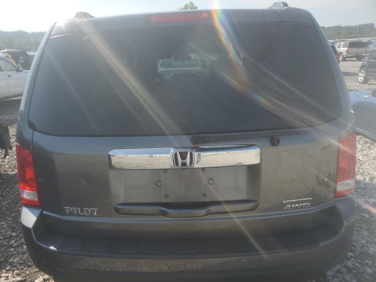 2011 Honda Pilot Touring VIN: 5FNYF4H96BB057142 Lot: 61851035