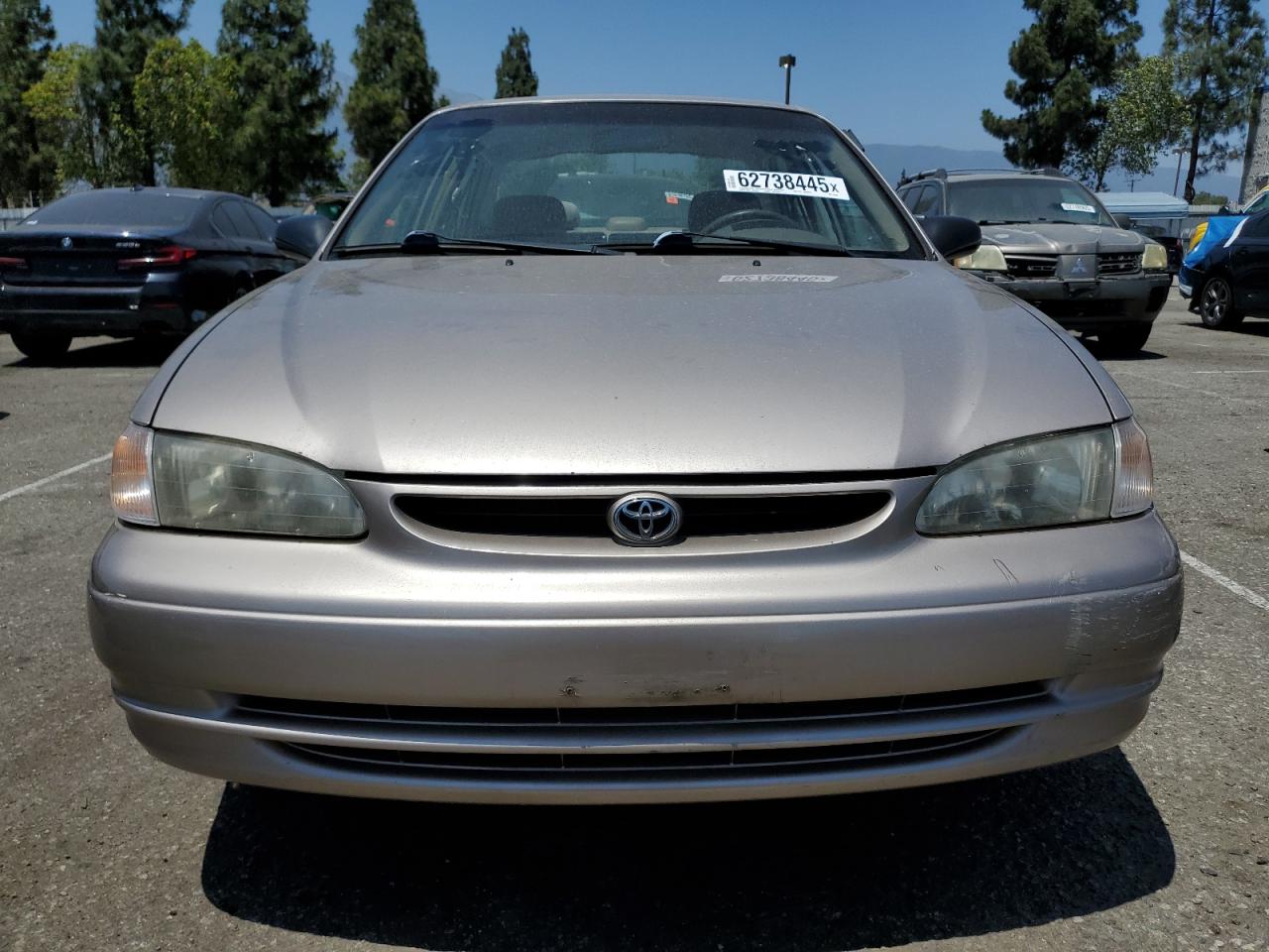 TOYOTA COROLLA 1999 VIN 1NXBR12E8XZ273165 фото 5
