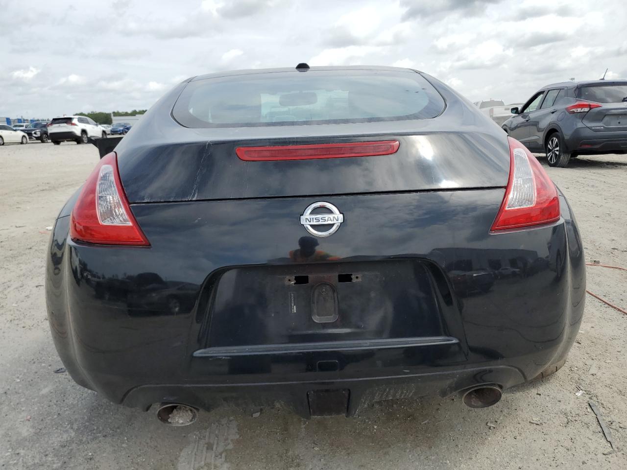 2009 Nissan 370Z VIN: JN1AZ44E69M407868 Lot: 60229915