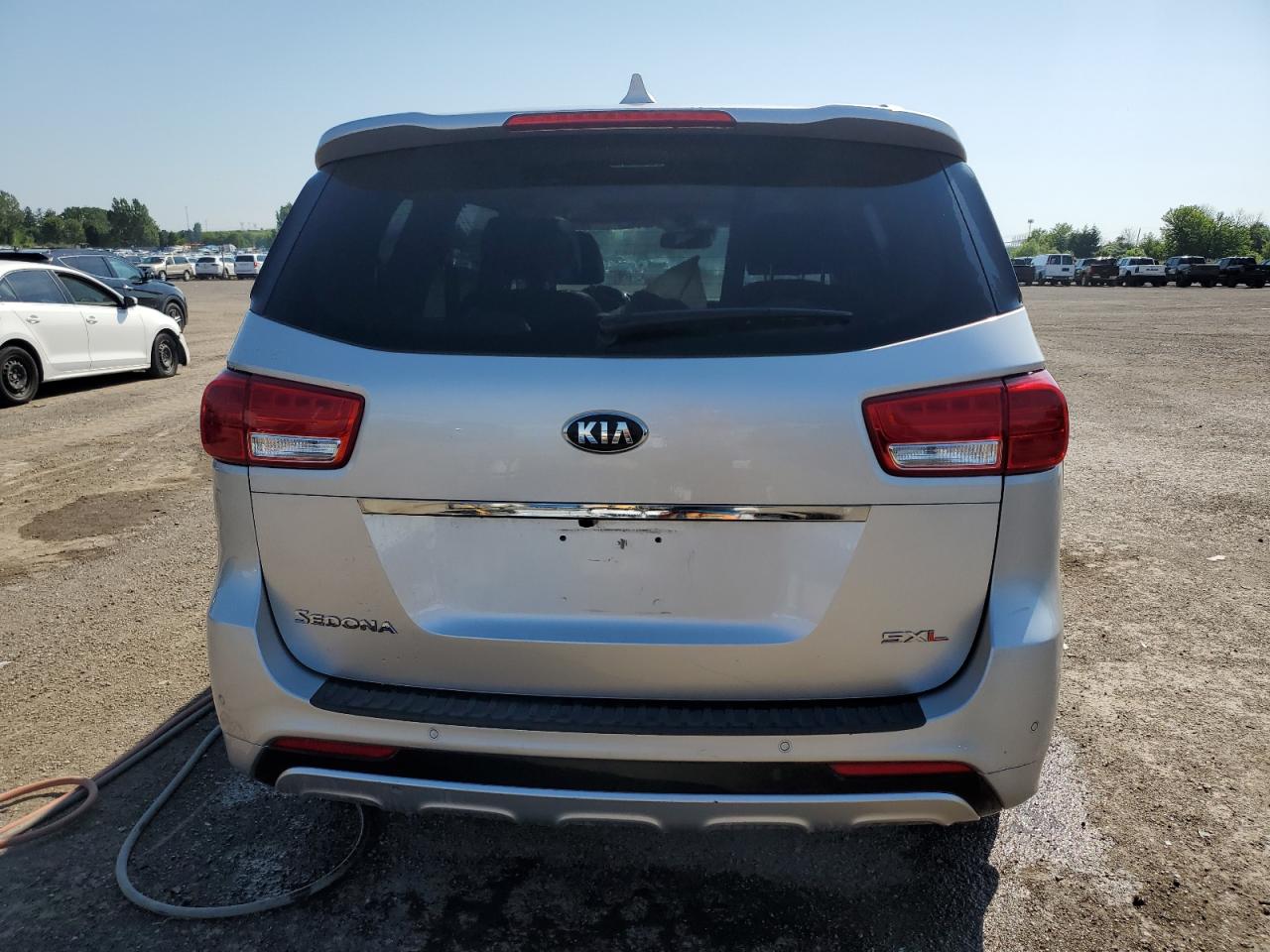 2016 Kia Sedona Sxl VIN: KNDME5C18G6211216 Lot: 59909665