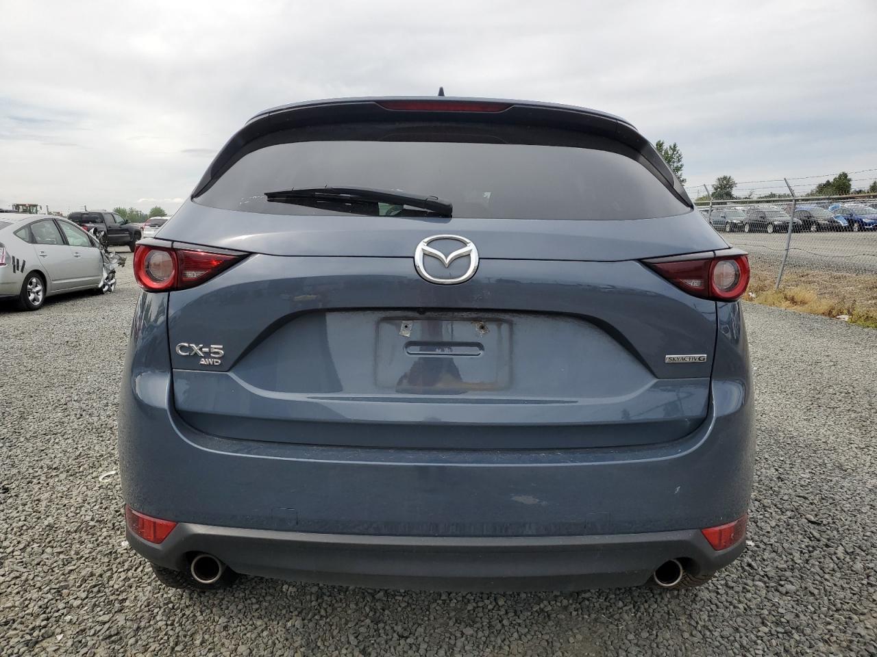 2021 Mazda Cx-5 Touring VIN: JM3KFBCM3M0375606 Lot: 62224735