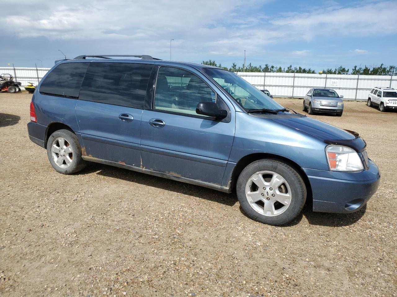 FORD FREESTAR 2006 VIN 2FMZA57206BA64731 zdjęcie 4