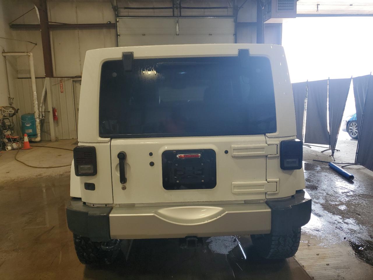 2015 Jeep Wrangler Unlimited Sahara VIN: 1C4HJWEG0FL560973 Lot: 59552135